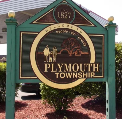 Sign welcoming people to Plymouth Township in Michigan